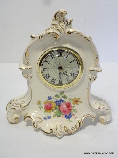 FLORAL PORCELAIN CLOCK CASE WITH QUARTZ FIT IN. MEASURES 11"T X 10"W RETAIL PRICE $175