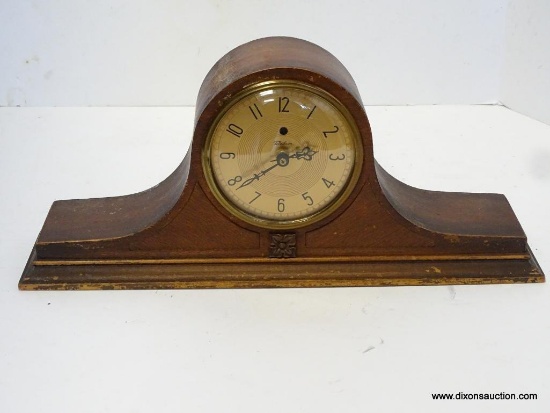 OAK TELECHROM TAMBOUR QUARTZ MANTLE CLOCK. MEASURES 7.25"T X 19"W RETAIL PRICE $75