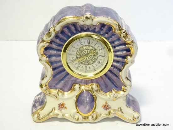 BLUE AND WHITE 30 HOUR FIT IN SHELF CLOCK. MEASURES 8.75"T X 8.5"W RETAIL PRICE $135