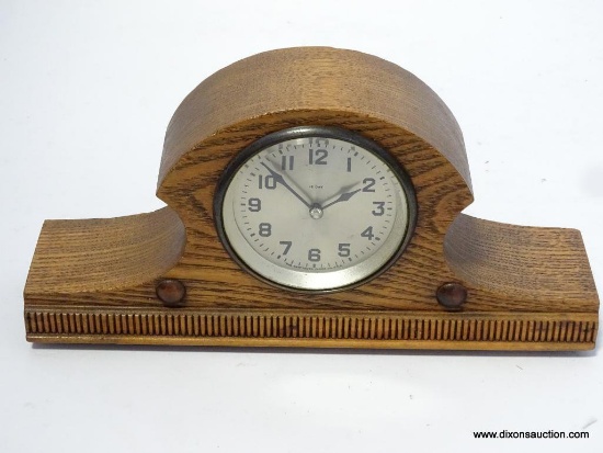 MINI NEW HAVEN OAK CASE TAMBOUR MARRIAGE MANTLE CLOCK. MEASURES 6"T X 12"W RETAIL PRICE $295