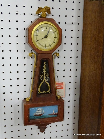 UNITED BANJO CLOCK WITH QUARTZ FIT-UP. MEASURES 18.5"T X 6"W RETAIL PRICE $75.