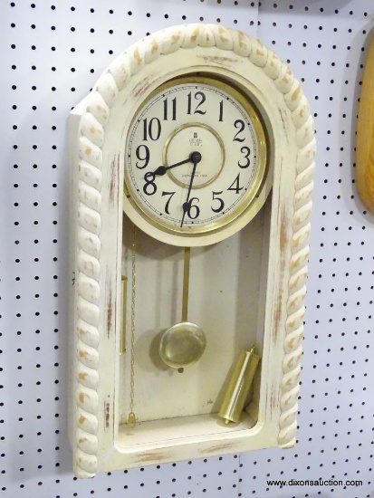 CROWN QUARTZ WALL CLOCK WITH WESTMINSTER CHIME. MEASURES 23"T X 12.5"W