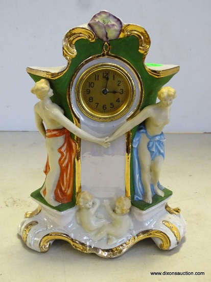 FIGURAL CLOCK MEASURES 10.5"T X 8"W. RETAIL PRICE $245