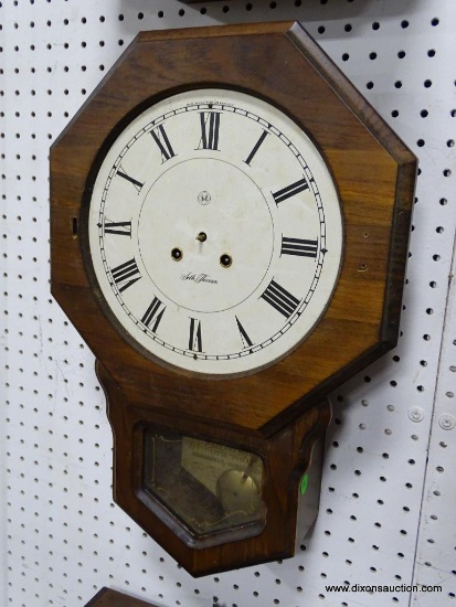 SETH THOMAS REGULATOR CLOCK WITH INTERIOR PAPER LABEL. MEASURES 21"T X 14"W
