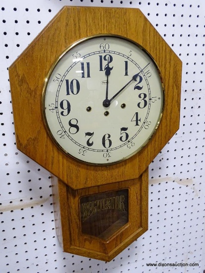 RIDGEWAY SCHOOL HOUSE OAK CASE CLOCK WITH CHIME. MEASURES 25"T X 16"W RETAIL PRICE $650