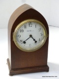 SETH THOMAS QUARTZ CLOCK. CASE AND FACE ARE OLD BUT HAS NEW QUARTZ MOVEMENT. 11.75'' TALL 7.25''