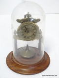 GERMAN ANNIVERSARY CLOCK. DOME IS CRACKED ON LEFT SIDE. 12'' TALL 8'' WIDE. RETAIL PRICE $250