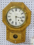 SETH THOMAS OAK SCHOOLHOUSE CLOCK WITH 8-DAY TIME. HAS OLDER CASE AND MOVEMENT WITH NEW BEZEL,