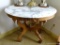 (SUNROOM) VICTORIAN MARBLE TOP TABLE WITH ROSE CARVED SKIRT: 33