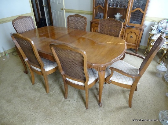 (DR) FRENCH QUEEN ANNE DINING TABLE WITH 6 UPHOLSTERED AND CANE BACK CHAIRS AND 1 LEAF. LEAF IS: 12"