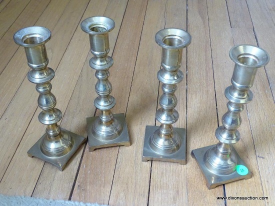 (DR) LOT OF 4 BRASS 8.5" TALL CANDLESTICK HOLDERS.