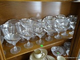 (DR) 28 SILVER RIMMED GLASSES (17 WATER GOBLETS. 11 SHERRY GLASSES) AND 7 SILVER RIMMED PLATES.