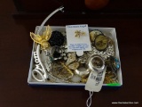 (2ND FLR MASTER BR) SMALL BOX FILLED WITH COSTUME JEWELRY: BROOCHES, PINS, RINGS, AND MORE!
