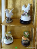 (DR) LOT OF 4 BIRD FIGURINES: 2 ARE MUSIC BOXES. 3 ARE ON ROSEWOOD STANDS.