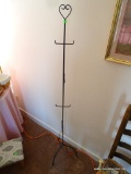 (2ND FLR BR 2) CAST IRON SPIDER LEGGED DISPLAY RACK WITH HEART SHAPED FINIAL. GREAT FOR HANGING