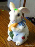 (KIT WINDOW) RABBIT WITH A CARROT SHAPED COOKIE JAR: 10