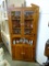 (A3) PINE CORNER CABINET WITH 2 GLASS DOORS OVER 2 BLIND DOORS. IS IN GOOD CONDITION 38X20X84