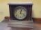 (A1) INGRAHAM MANTLE CLOCK. PENDULUM INCLUDED. THIS CLOCK IS RUNNING. 11.25X5.5X10.25