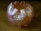 (A1) CARNIVAL GLASS ROSE BOWL. UNIQUE 6 FOOTED BASE. 5X4 IS IN GOOD CONDITION