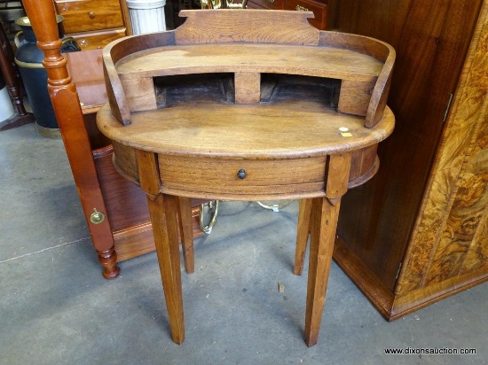 (A1) OVAL WALNUT 1 DRAWER TABLE WITH ELEVATED GALLERY. 28X19X34.5