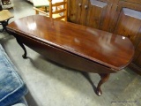 (A3) QUEEN ANNE MAHOGANY DROP SIDE COFFEE TABLE. 49X19X17. EACH SIDE IS 8.25'' WIDE. IN GOOD