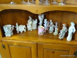 (A3) SHELF LOT OF FIGURINES. INCLUDES 10 SMALL FIGURAL STATUES AND 1 VINTAGE CUP.