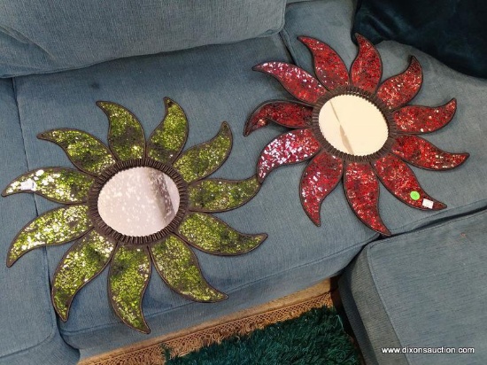 (FURNITURE ROW 1) 2 METAL AND GLASS SUN SHAPED MIRRORS (1 IN RED AND 1 IN GREEN): 20" DIA.