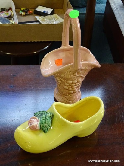 (FURNITURE ROW 1) 2 PIECES OF MCCOY POTTERY: 1 PINK HANDLED BASKET: 5.5"x9" AND 1 SHOE WITH A ROSE: