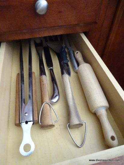 (K) 2 DRAWER LOT. THAT INCLUDES BBQ UTENSILS, CARVING SET, A KNIFE A SMALL ROLLING PIN AND SOME HAND