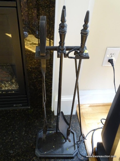 (FR) SET OF BLACK IRON FIREPLACE TOOLS. INCLUDES TONGS, SHOVEL, POKER AND HOOK.