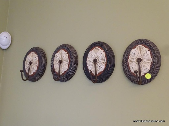 (LR) 4 BEAUTIFUL DECORATIVE WALL HOOKS. WOULD BE GREAT FOR ANY FOYER!
