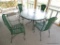 (PORCH) CAST IRON AND PLEXIGLASS TOP OUTDOOR UMBRELLA TABLE AND 4 CHAIRS. TABLE: 48