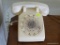 (LR) VINTAGE ROTARY DIAL PHONE IN CREAM