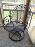 (PORCH) 1 OF A PAIR OF CAST IRON AND MESHED WIRE SWIVEL OUTDOOR ARMCHAIRS: 23