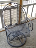 (PORCH) 1 OF A PAIR OF CAST IRON AND MESHED WIRE SWIVEL OUTDOOR ARMCHAIRS: 23