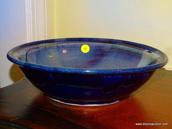 (FH) SIGNED ART POTTERY BOWL IN BLUE AND PURPLE: 11" DIA.