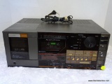 MITSUBISHI AM/FM STEREO CASSETTE AUTOCHANGER SYSTEM DA- L70. HOLDS 7 CASSETTE TAPES. APPEARS TO BE