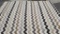 (ROW 1) BRAIDED RUG IN ZIG ZAG BROWN, GRAY, AND CREAM PATTERN: 9' 11