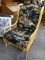 (ROW 1) 1 OF A PAIR OF RATTAN ARM CHAIRS WITH ORIENTAL STYLE CUSHIONS: 25