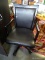 (ROW 4) ASHLEY HOME FURNITURE ROLLING AND ADJUSTABLE LEATHER UPHOLSTERED OFFICE ARMCHAIR: