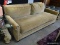 (ROW 5) POTTERY BARN SINGLE CUSHION SOFA WITH BRASS STUDDING AROUND THE ARMS AND MAHOGANY FEET: