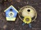 (OUT) 2 HANGING BIRDHOUSES (1 SUNFLOWER PAINTED. 1 IN THE SHAPE OF A HAT)