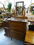 (ROW 4) ANTIQUE OAK 5 DRAWER TALL CHEST WITH MIRROR. TOP HAS A SERPENTINE FRONT: 30