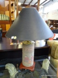(ROW 5) UPHOLSTERED LAMP WITH IMAGE OF MAN PLAYING GOLF. HAS SHADE AND FINIAL: 6