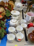 (TABLE ROW 1) 21 PIECE TEA SET WITH PAINTED CHILDREN