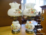 (ROW 2) PAIR OF FLORAL PAINTED AND MILK GLASS OIL LAMPS CONVERTED TO ELECTRIC WITH SHADES AND