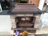 (OUT) METAL AND ARTIFICIAL STONE OUTDOOR FIREPLACE. WOULD BE GREAT FOR COOKOUTS, PARTIES, OR JUST