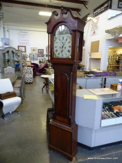(FRONT, ROW 2) Antique Chippendale tall case clock with bracket feet. with the original weights and