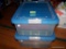 (SEC3, UNDER TABLE) LOT OF 2 PLASTIC CONTAINERS WITH BLUE LIDS, FILLED WITH PHOTO ALBUMS