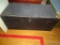 (ROW2 FRONT) BLACK PAINTED WOODEN CHEST, 32